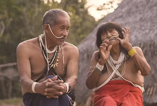 two old tribal man and women - Amazon Tribe Faces Addiction to Prn and Social Media